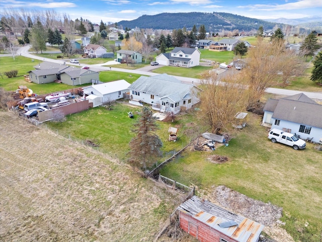 385 Meadow Hills Dr, Kalispell, MT 59901 - aerial perspective of suburban area with a mountain backdrop