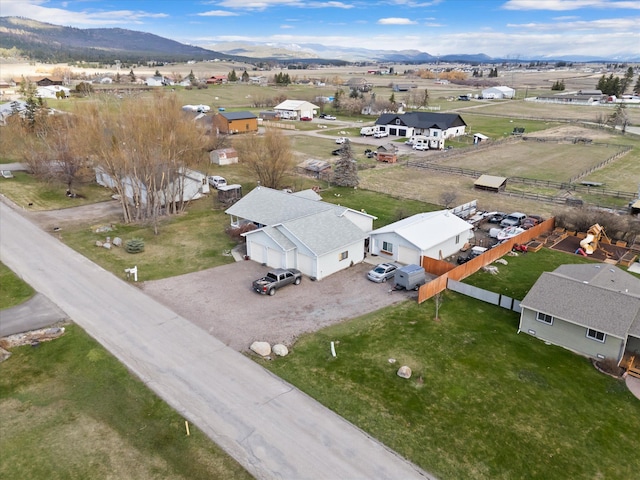 385 Meadow Hills Dr, Kalispell, MT 59901 - aerial perspective of suburban area with mountains