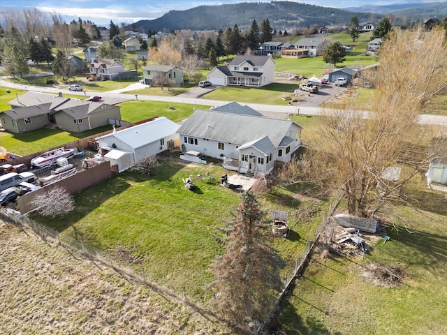 385 Meadow Hills Dr, Kalispell, MT 59901 - aerial view of residential area featuring a mountain backdrop
