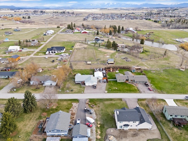 385 Meadow Hills Dr, Kalispell, MT 59901 - aerial view of property and surrounding area with nearby suburban area