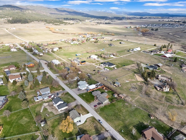 385 Meadow Hills Dr, Kalispell, MT 59901 - aerial view of property's location with mountains and nearby suburban area
