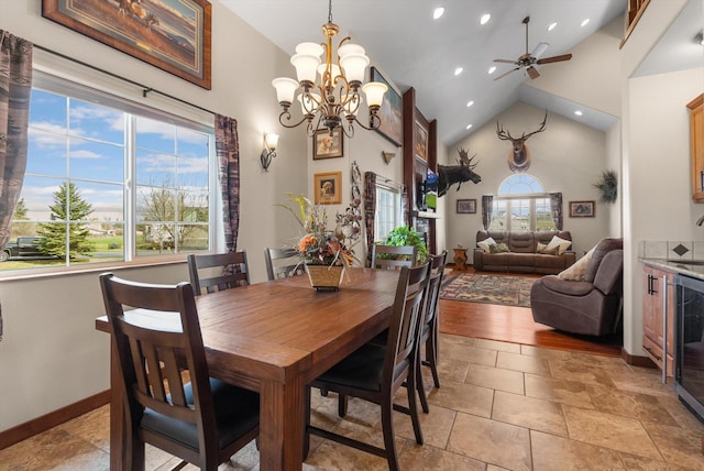 8 Primrose Ct, Kalispell, MT 59901 - dining space featuring recessed lighting, a ceiling fan, high vaulted ceiling, baseboards, and a chandelier