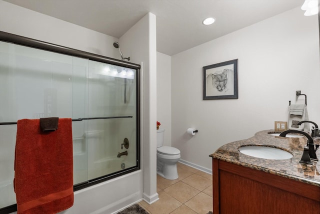 8 Primrose Ct, Kalispell, MT 59901 - full bathroom with toilet, tile patterned floors, combined bath / shower with glass door, vanity, and baseboards