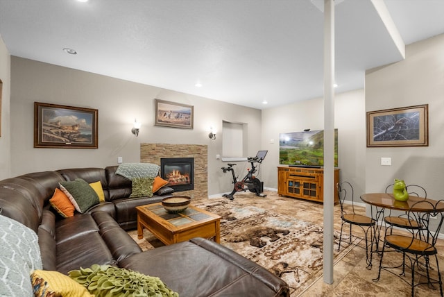 8 Primrose Ct, Kalispell, MT 59901 - living area featuring a glass covered fireplace, recessed lighting, and baseboards