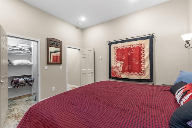 8 Primrose Ct, Kalispell, MT 59901 - bedroom with a walk in closet, recessed lighting, and baseboards