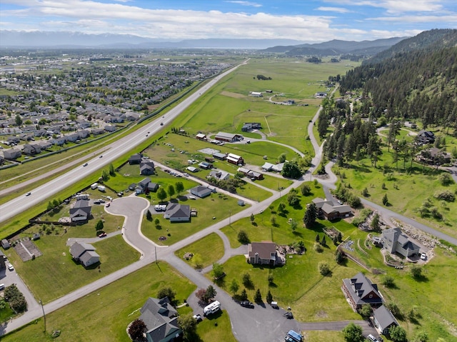 8 Primrose Ct, Kalispell, MT 59901 - aerial view of property and surrounding area featuring mountains