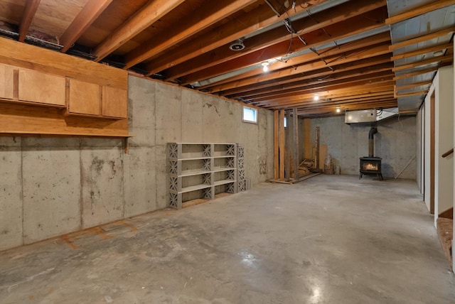 220 Ferndale Dr, Bigfork, MT 59911 - below grade area with a wood stove