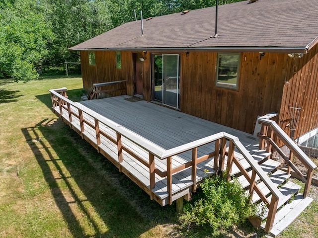 220 Ferndale Dr, Bigfork, MT 59911 - wooden deck featuring a lawn