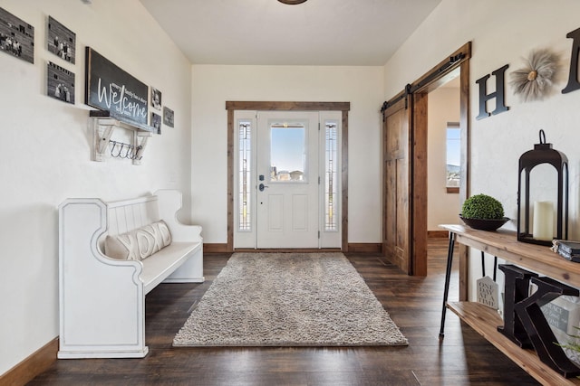2650 W Valley Dr, Kalispell, MT 59901 - living area featuring baseboards, visible vents, ceiling fan, wood finished floors, and a fireplace