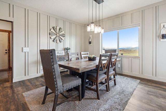2650 W Valley Dr, Kalispell, MT 59901 - dining area featuring a stone fireplace, dark wood-type flooring, and recessed lighting