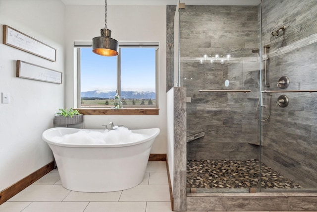 2650 W Valley Dr, Kalispell, MT 59901 - ensuite bathroom with tile patterned floors, two vanities, and a spacious closet