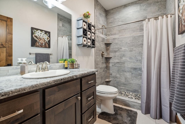 2650 W Valley Dr, Kalispell, MT 59901 - bathroom featuring toilet, visible vents, baseboards, and vanity