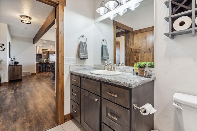 2650 W Valley Dr, Kalispell, MT 59901 - utility room featuring strapped water heater and water heater