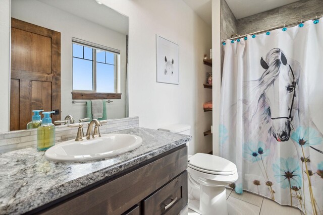 2650 W Valley Dr, Kalispell, MT 59901 - bathroom with a shower stall, vanity, and toilet