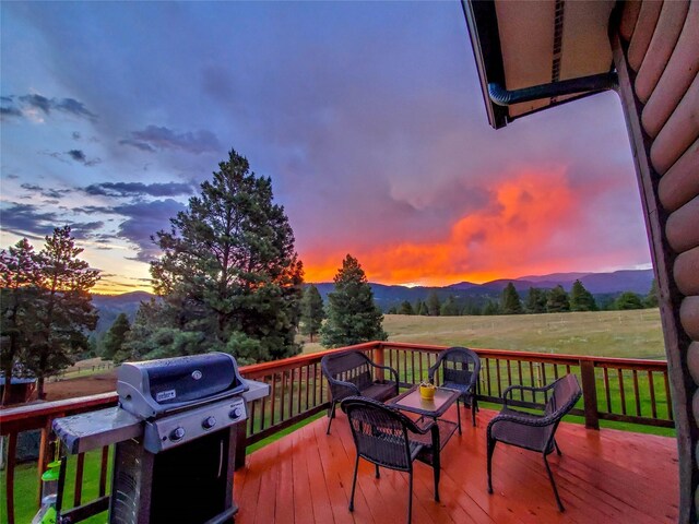 5 Alpine Valley Ln, Clancy, MT 59634 - deck at dusk featuring grilling area and a mountain view