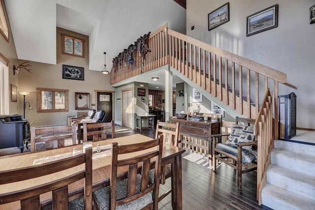 5 Alpine Valley Ln, Clancy, MT 59634 - dining space with stairs, a high ceiling, and hardwood / wood-style floors