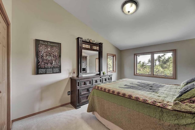 5 Alpine Valley Ln, Clancy, MT 59634 - bedroom with light colored carpet and lofted ceiling