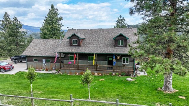 5 Alpine Valley Ln, Clancy, MT 59634 - cabin featuring a porch and roof with shingles