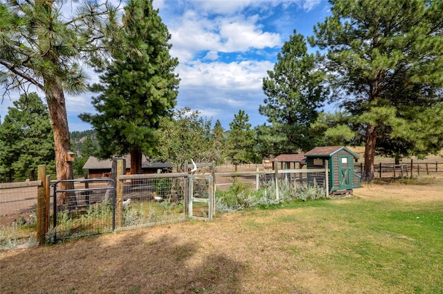 5 Alpine Valley Ln, Clancy, MT 59634 - view of yard with a gate, an outbuilding, and exterior structure