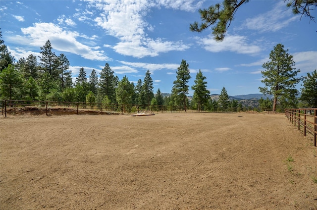 5 Alpine Valley Ln, Clancy, MT 59634 - view of yard with an enclosed horse arena, a view of countryside, and a mountain view