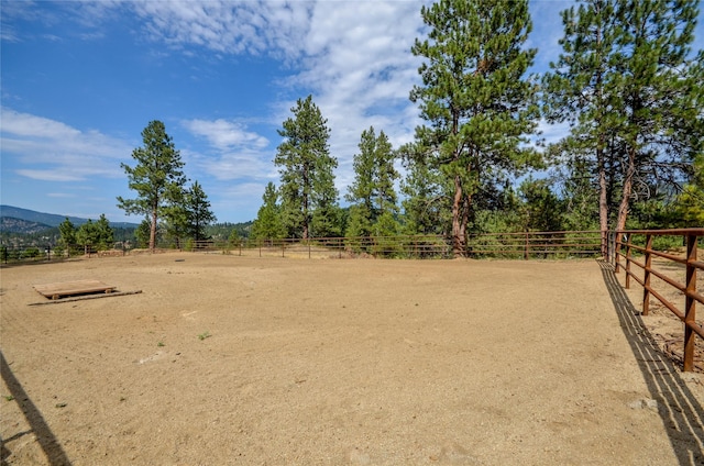 5 Alpine Valley Ln, Clancy, MT 59634 - view of yard with an enclosed horse arena and a view of rural / pastoral area
