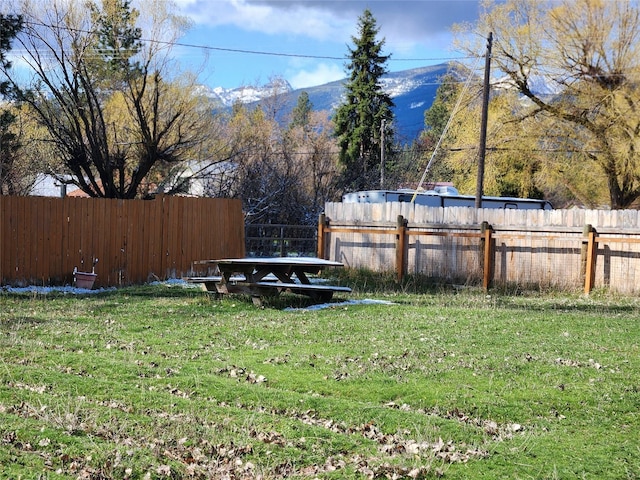 105 Stapp Ln, Darby, MT 59829 - view of yard with a mountain view and fence