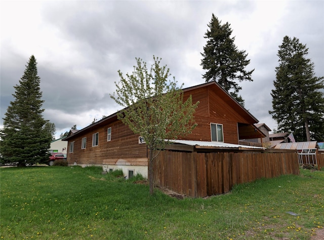 261 Locust Ln, Seeley Lake, MT 59868 - view of home's exterior with a lawn