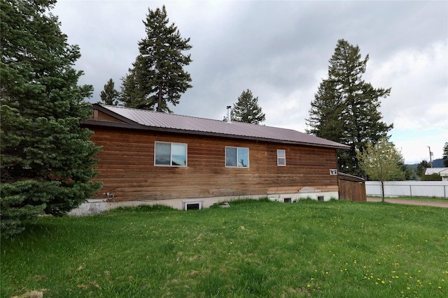 261 Locust Ln, Seeley Lake, MT 59868 - view of home's exterior featuring metal roof