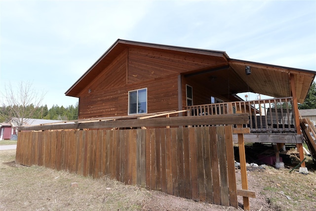 261 Locust Ln, Seeley Lake, MT 59868 - view of side of property featuring a deck
