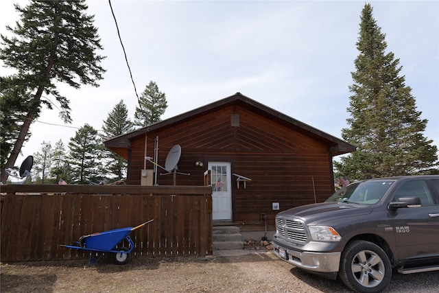 261 Locust Ln, Seeley Lake, MT 59868 - view of side of home featuring fence