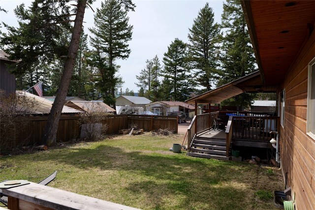 261 Locust Ln, Seeley Lake, MT 59868 - view of yard featuring a wooden deck
