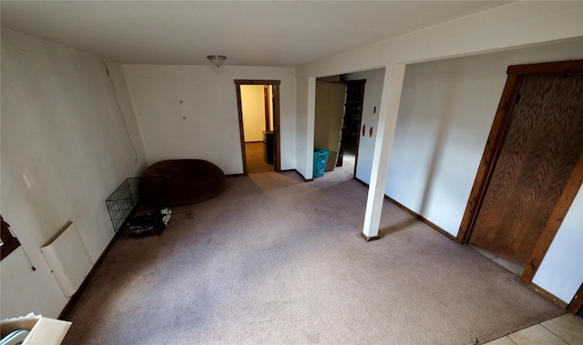 261 Locust Ln, Seeley Lake, MT 59868 - unfurnished bedroom with carpet floors and multiple closets