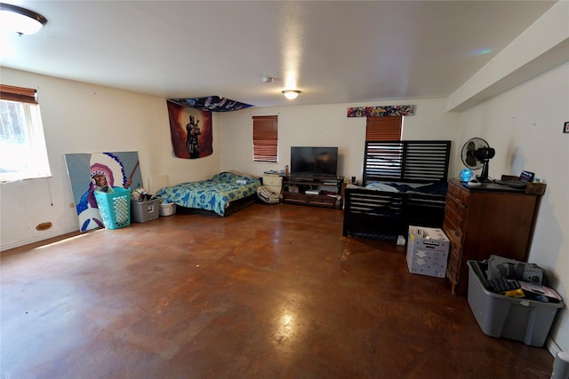 261 Locust Ln, Seeley Lake, MT 59868 - bedroom with concrete flooring