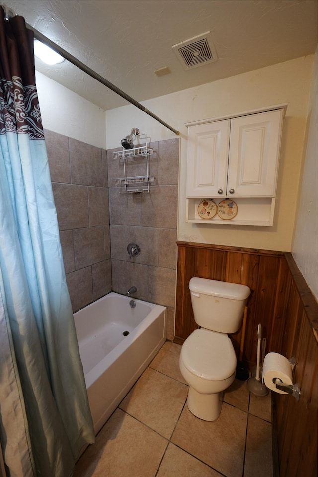 261 Locust Ln, Seeley Lake, MT 59868 - bathroom with shower / bath combo, tile patterned floors, and toilet