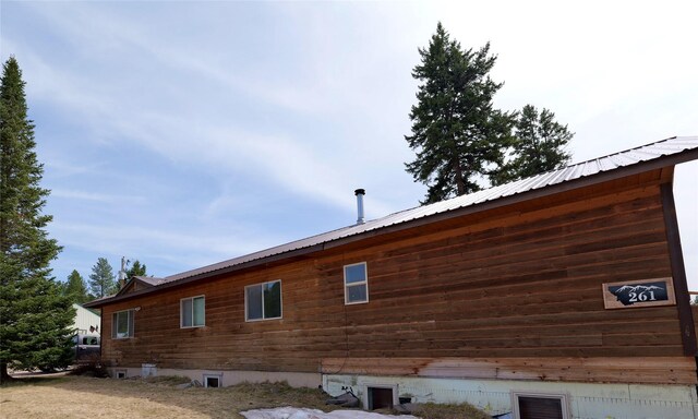 261 Locust Ln, Seeley Lake, MT 59868 - view of side of property with metal roof