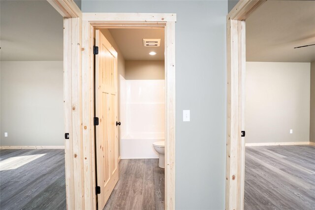 471 Lower Deep Creek Rd, Townsend, MT 59644 - hallway with visible vents, baseboards, and wood finished floors