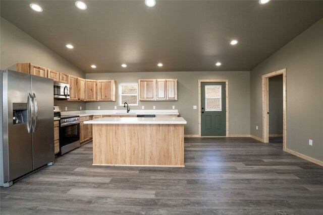 471 Lower Deep Creek Rd, Townsend, MT 59644 - kitchen featuring light countertops, light brown cabinets, lofted ceiling, and stainless steel appliances