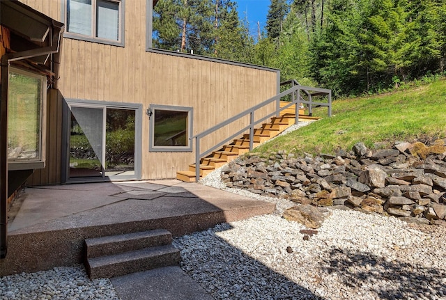 2041 Sleeping Child Rd, Hamilton, MT 59840 - view of home's exterior with stairs and a patio