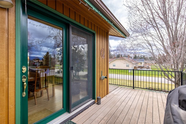 deck featuring a grill