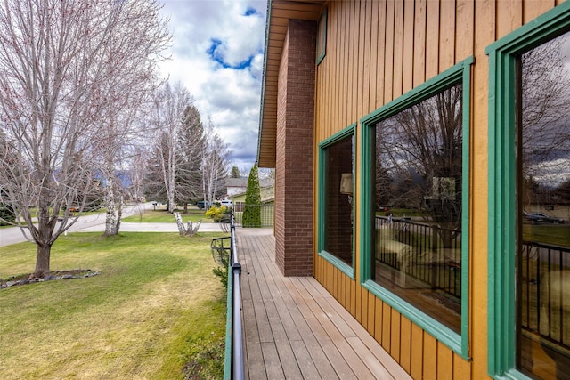 view of property exterior with a yard