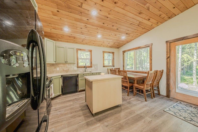 1365 Bierney Creek Rd, Lakeside, MT 59922 - kitchen with black appliances, vaulted ceiling, light countertops, wooden ceiling, and a center island