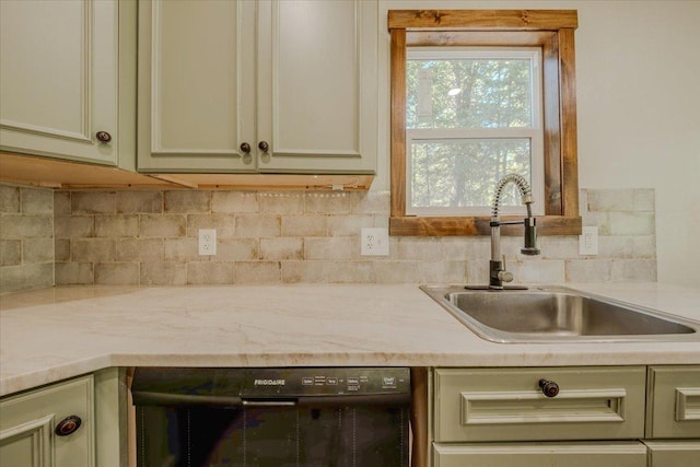 1365 Bierney Creek Rd, Lakeside, MT 59922 - kitchen featuring dishwasher, backsplash, and light stone countertops