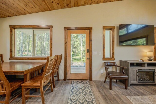 1365 Bierney Creek Rd, Lakeside, MT 59922 - dining area featuring lofted ceiling, wood finished floors, and wooden ceiling