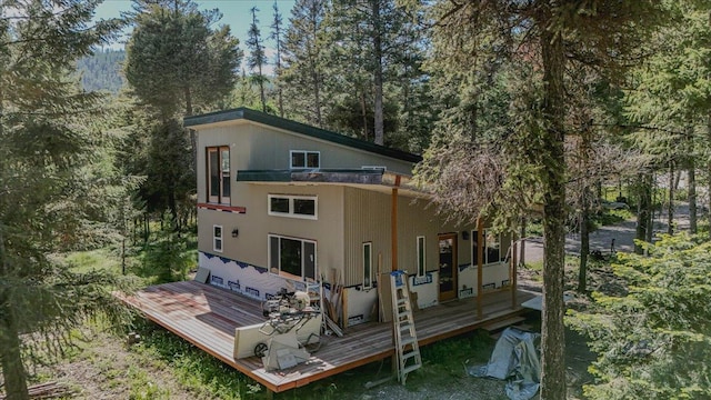 1365 Bierney Creek Rd, Lakeside, MT 59922 - back of house with a wooden deck