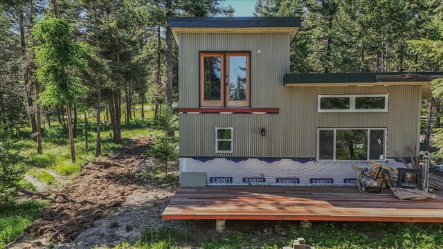 1365 Bierney Creek Rd, Lakeside, MT 59922 - rear view of house featuring a wooden deck