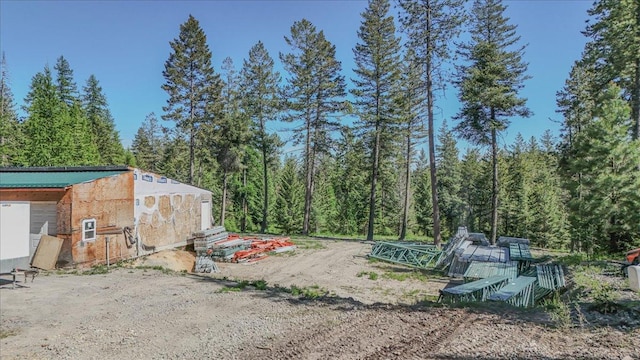 1365 Bierney Creek Rd, Lakeside, MT 59922 - view of yard featuring a view of trees