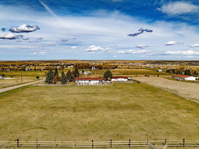 birds eye view of property featuring a rural view