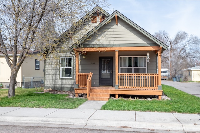 view of front of home featuring covered porch