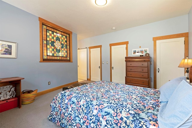 carpeted bedroom with baseboards