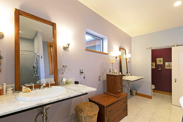 bathroom featuring toilet, a shower stall, and marble finish floor